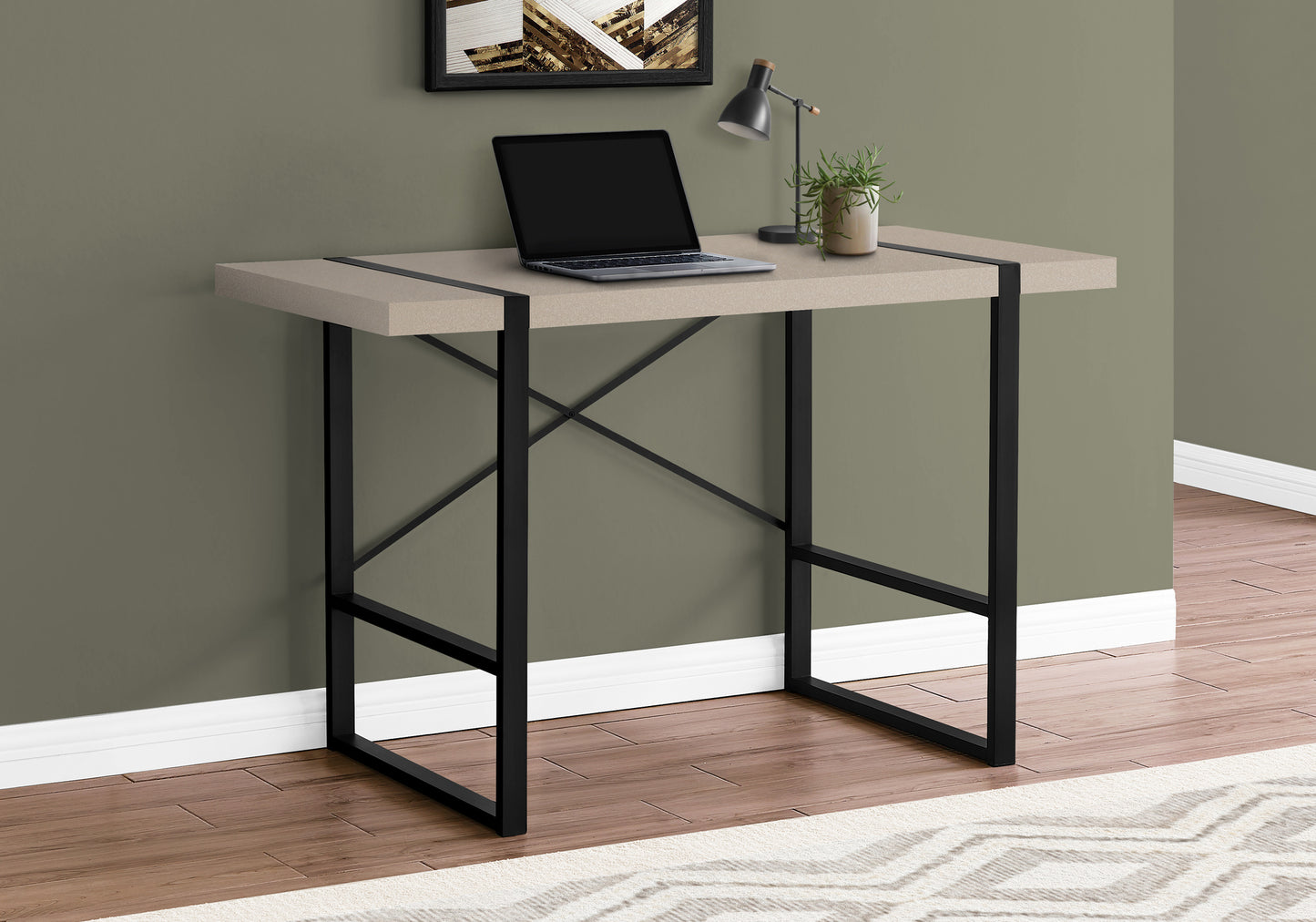 Modern beige desk with black metal frame and integrated laptop for home office setup