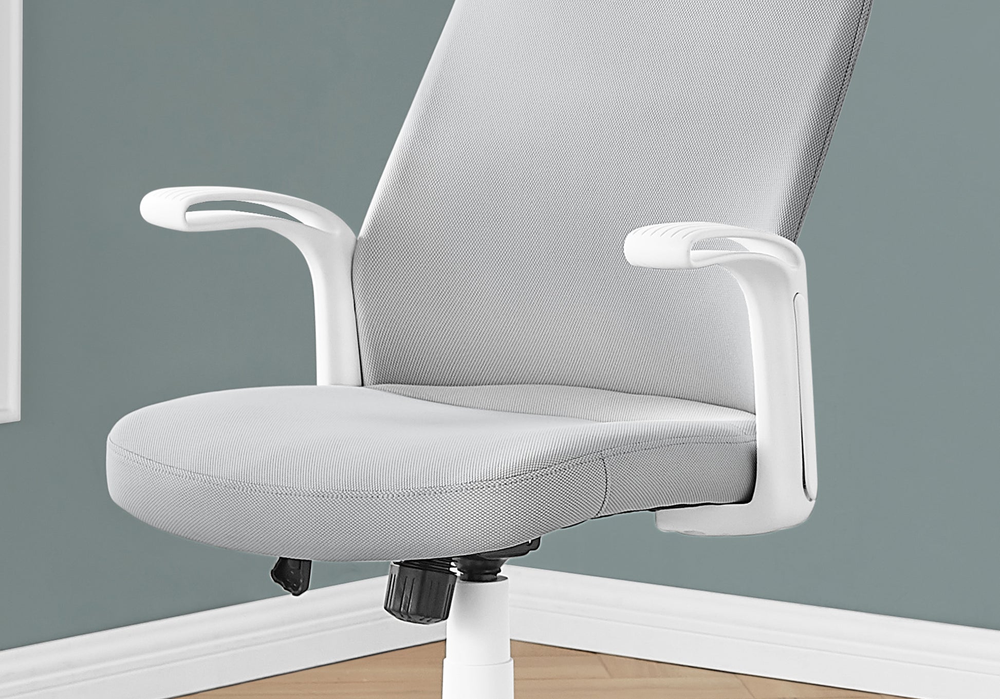 Light gray mesh ergonomic office chair with white armrests and base