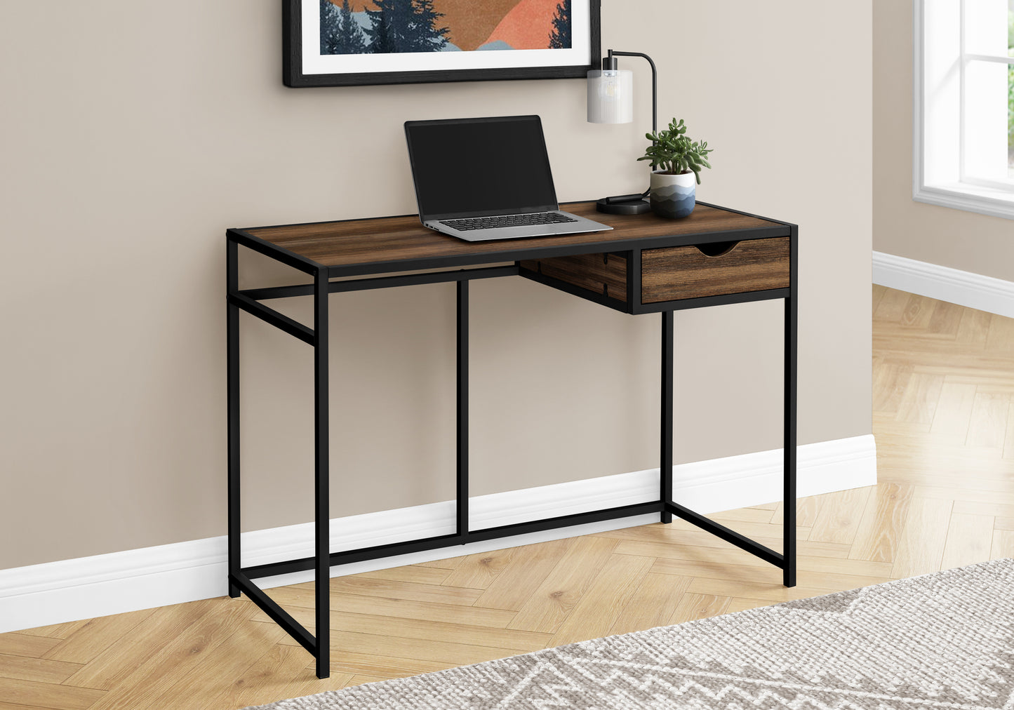 Compact dark wood desk with black metal frame and single drawer