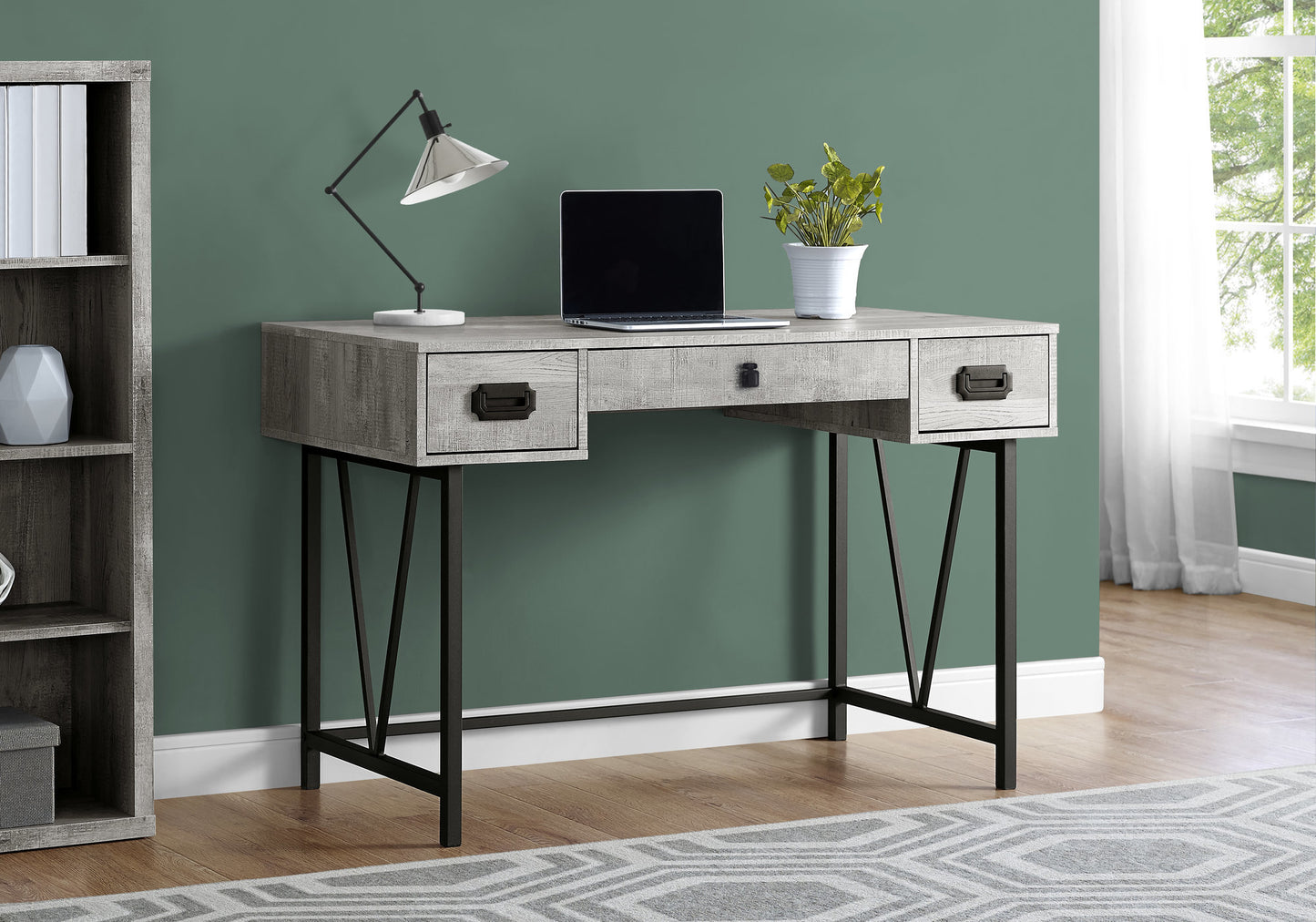 Rustic gray wood writing desk with black metal legs and three drawers