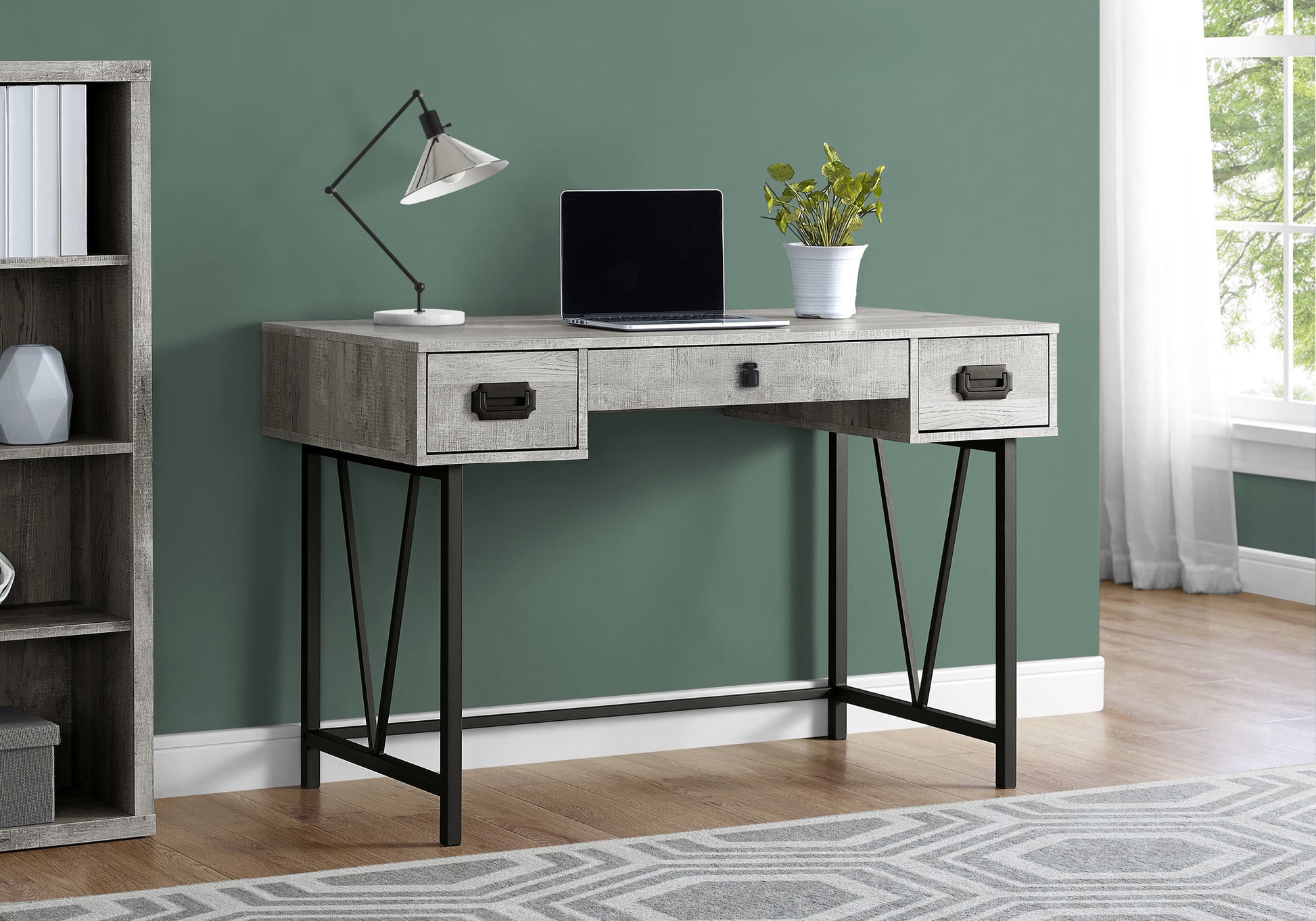 Rustic gray wood writing desk with black metal legs and three drawers