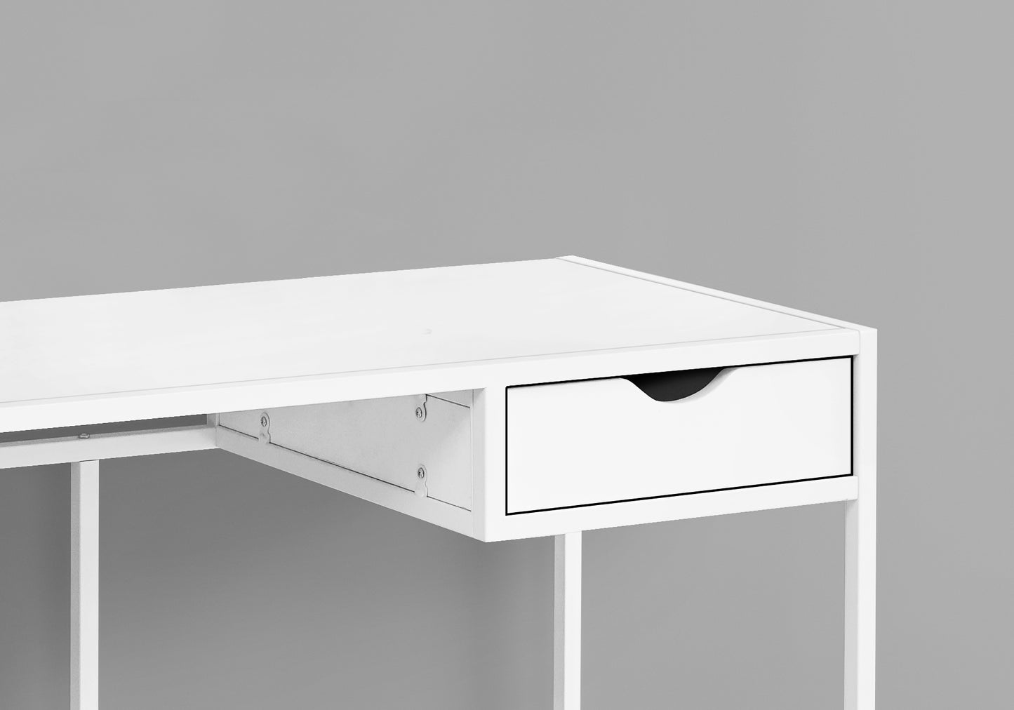 Minimalist white desk with one drawer and open shelving