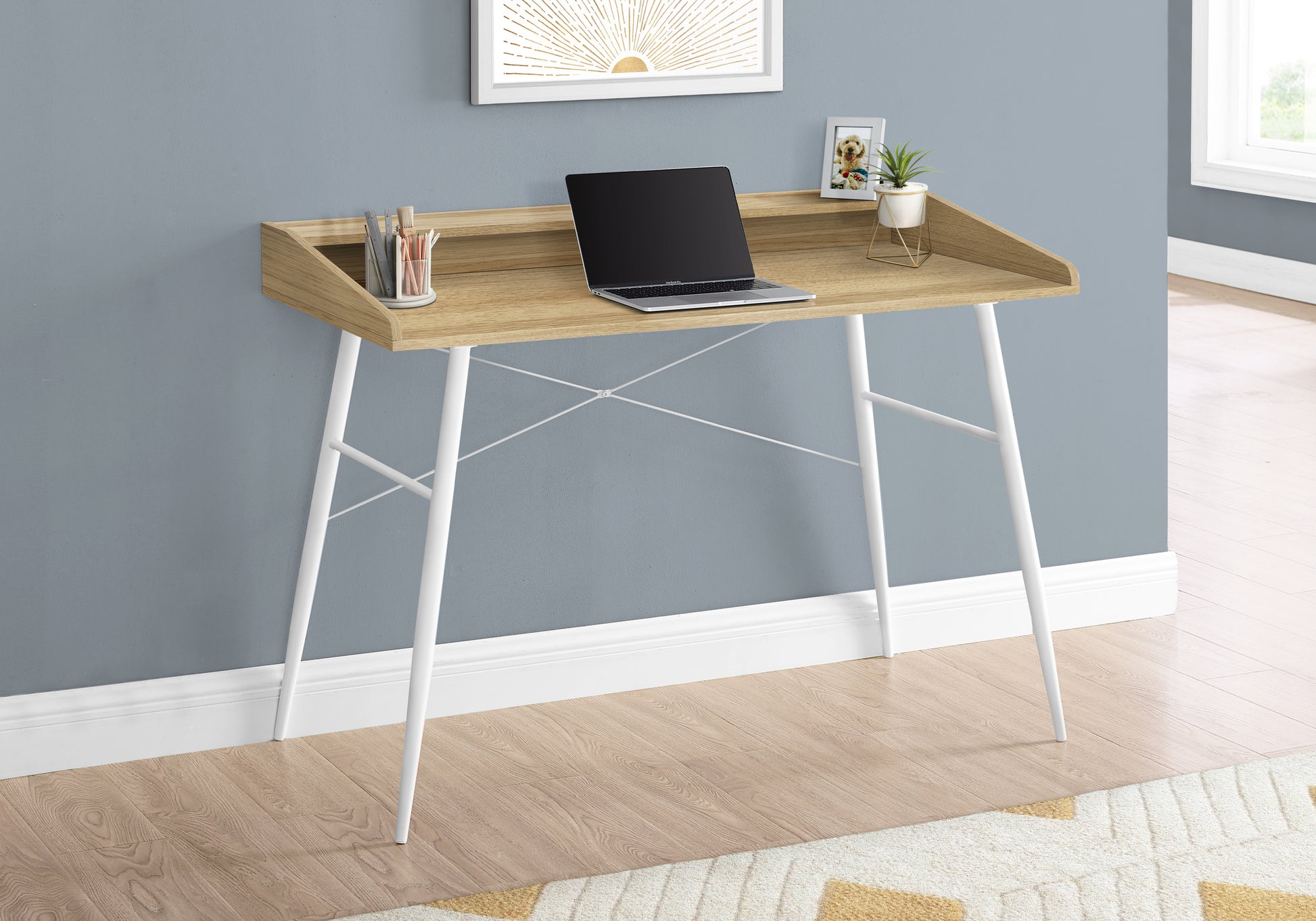 Light oak writing desk with white metal legs and minimalist design