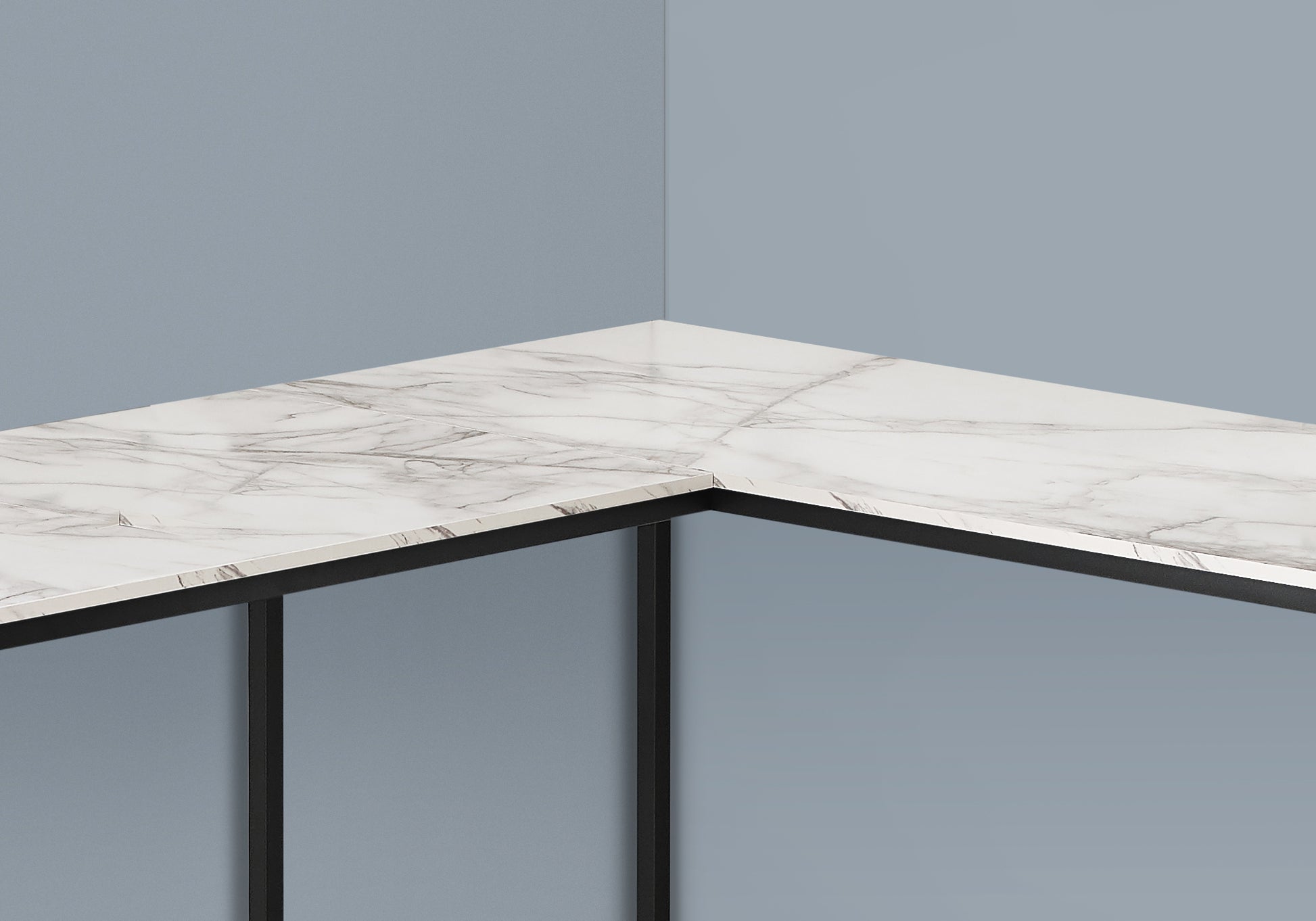 Modern white marble countertop with thin black metal legs ideal for kitchens