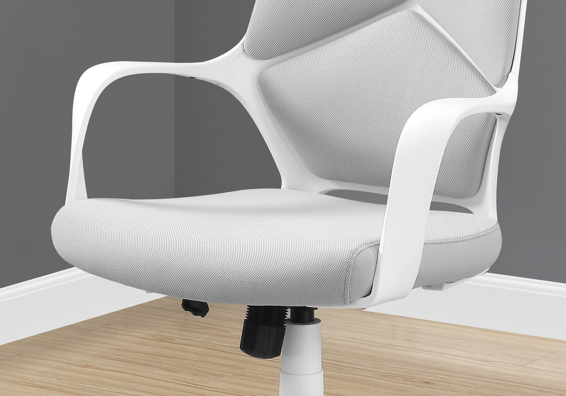 Modern white mesh office chair with ergonomic support and adjustable height