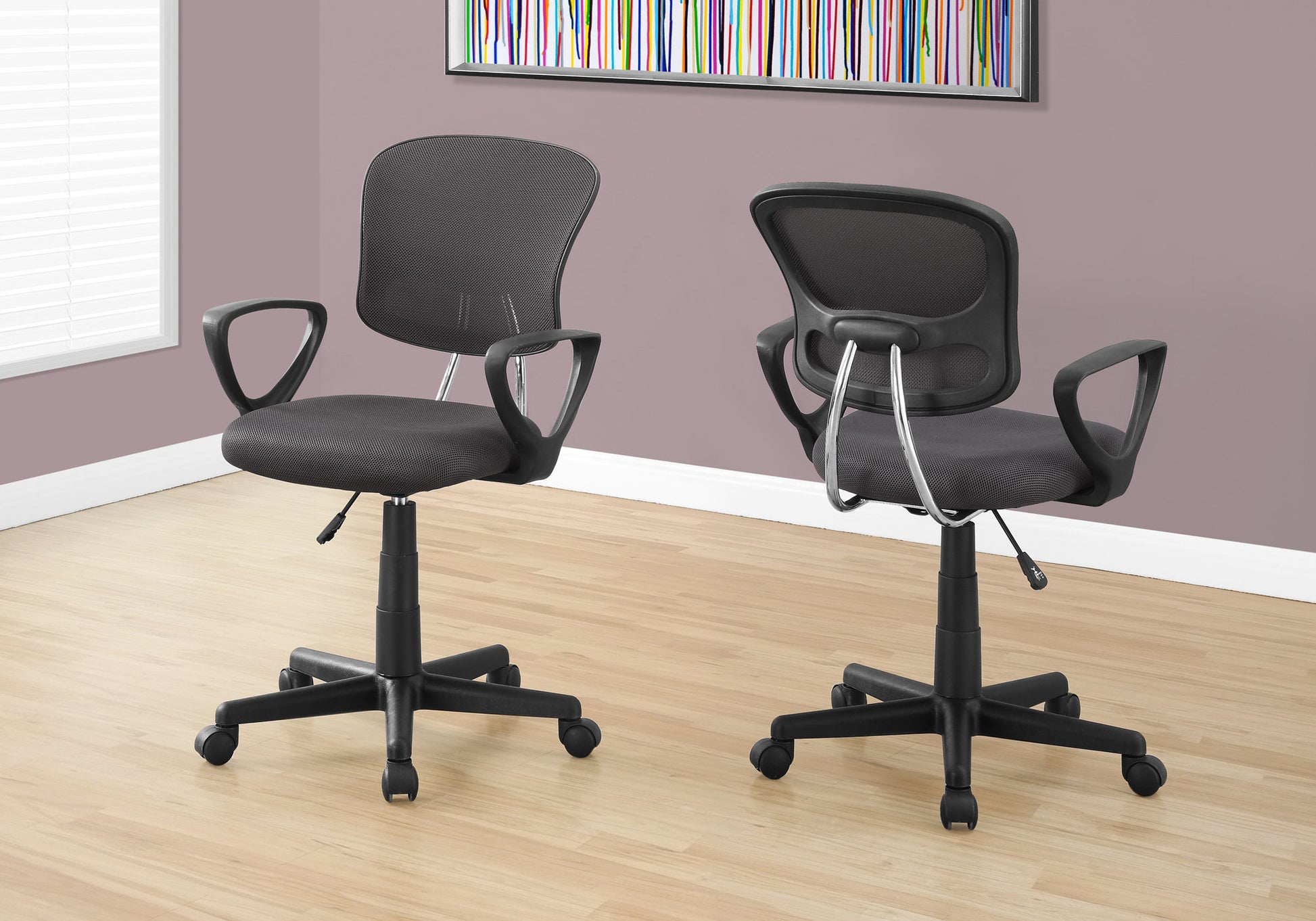 Black mesh ergonomic office chair with adjustable height and armrests