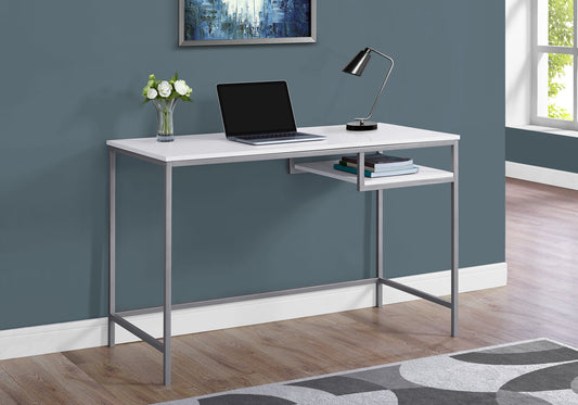Sleek white and silver metal frame writing desk with a laptop and lamp
