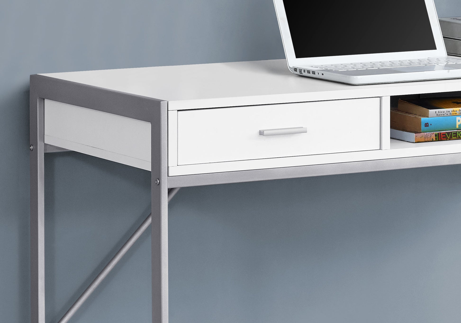 White modern desk with silver metal frame and a single drawer