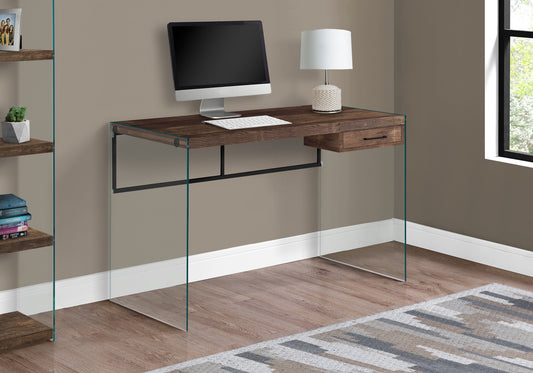 Dark wood desk with clear glass legs perfect for modern home office