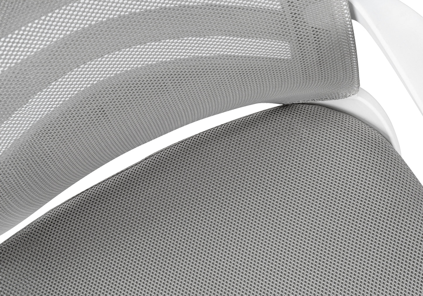 Closeup of gray mesh fabric on an ergonomic office chair back and seat