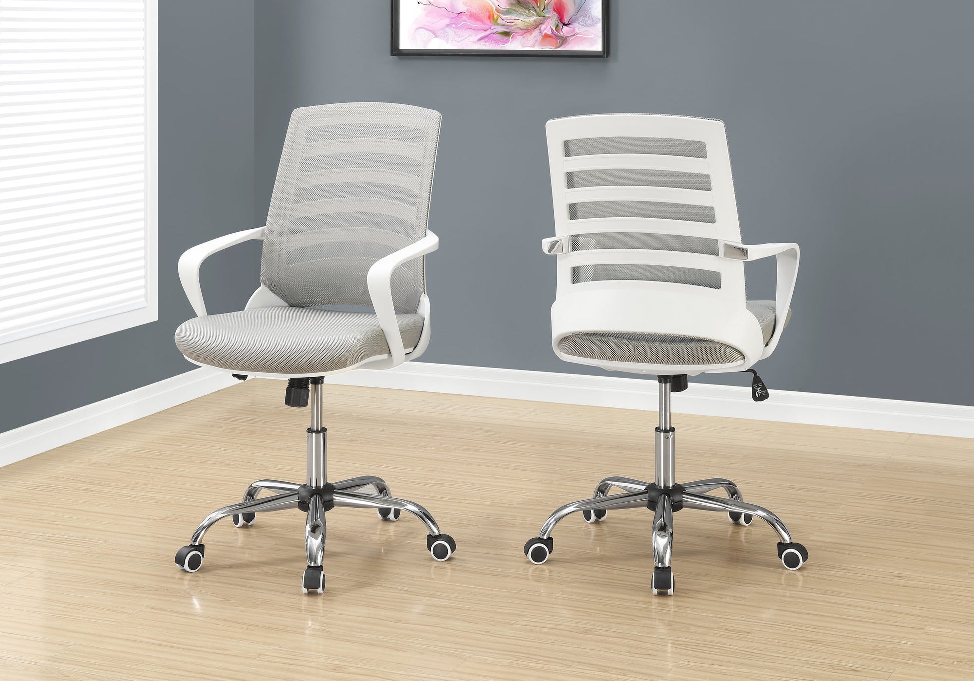 Grey mesh office chair with white accents ideal for modern workspaces
