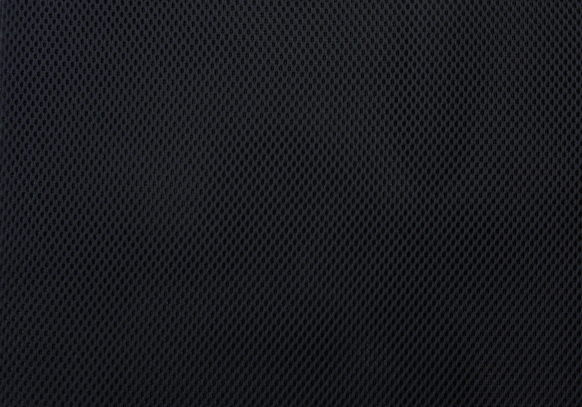 Black mesh fabric closeup showing breathable diamond pattern for upholstery