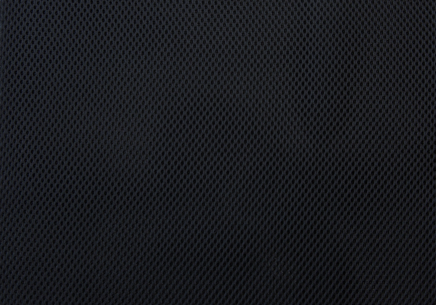 Closeup of black mesh fabric with a hexagonal pattern ideal for breathable apparel