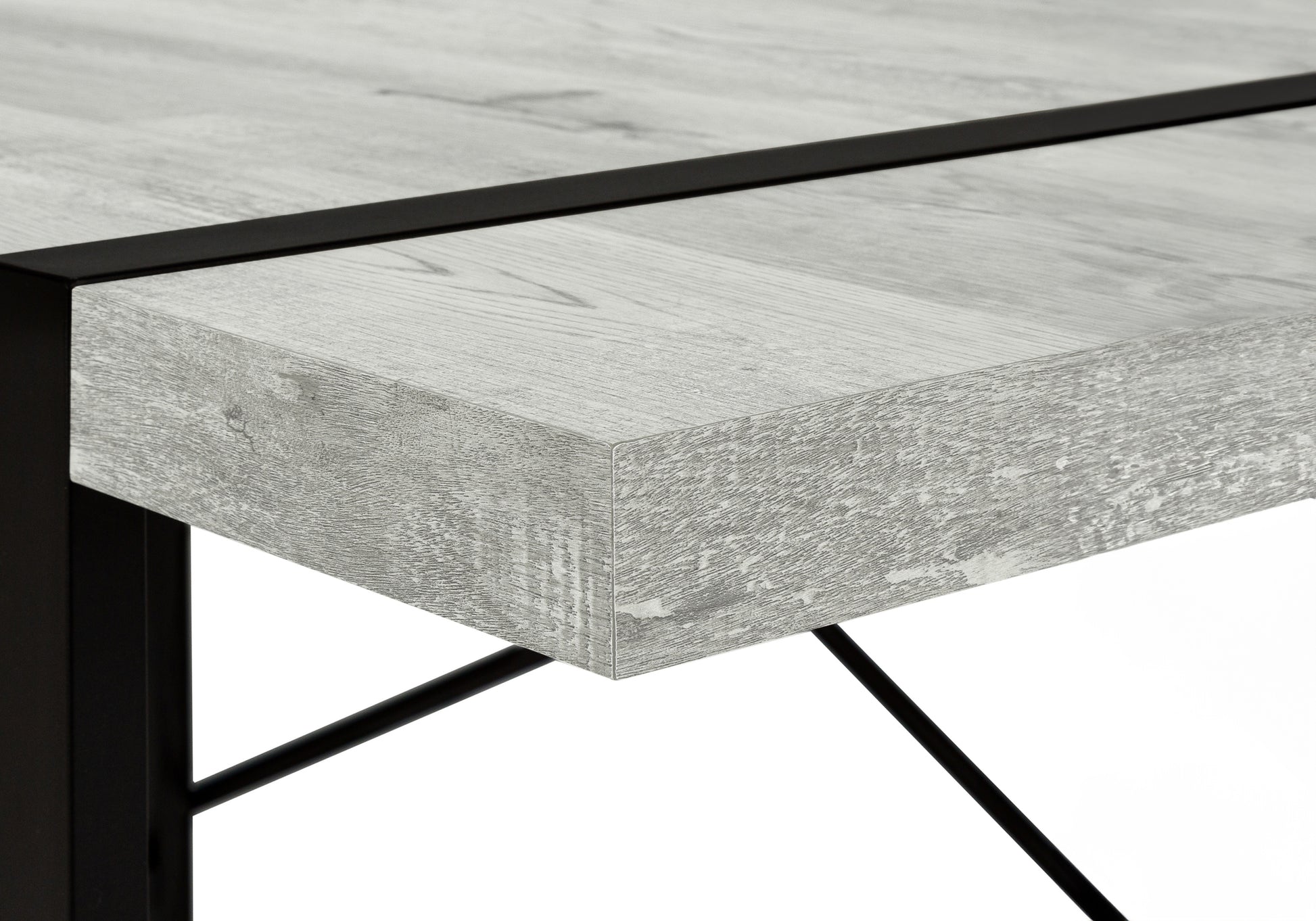 Rustic grey wood grain desk surface with black metal frame accent