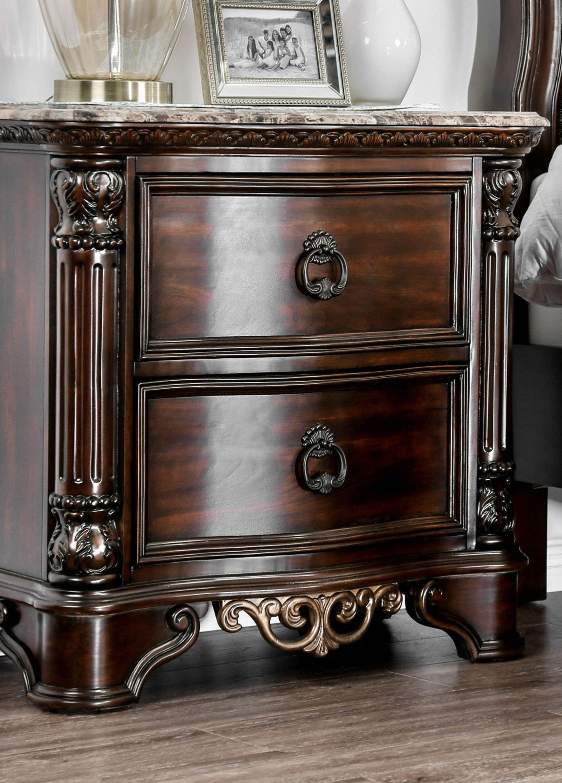Ornate dark wood nightstand with marble top and two drawers