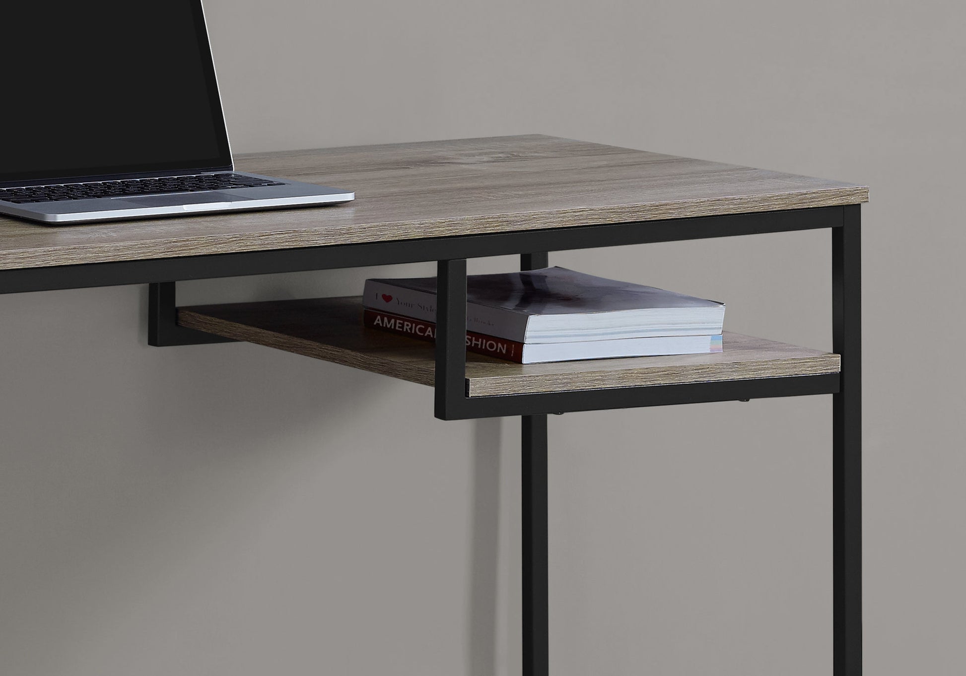 Modern wooden computer desk with black metal frame and integrated shelf perfect for home office setup