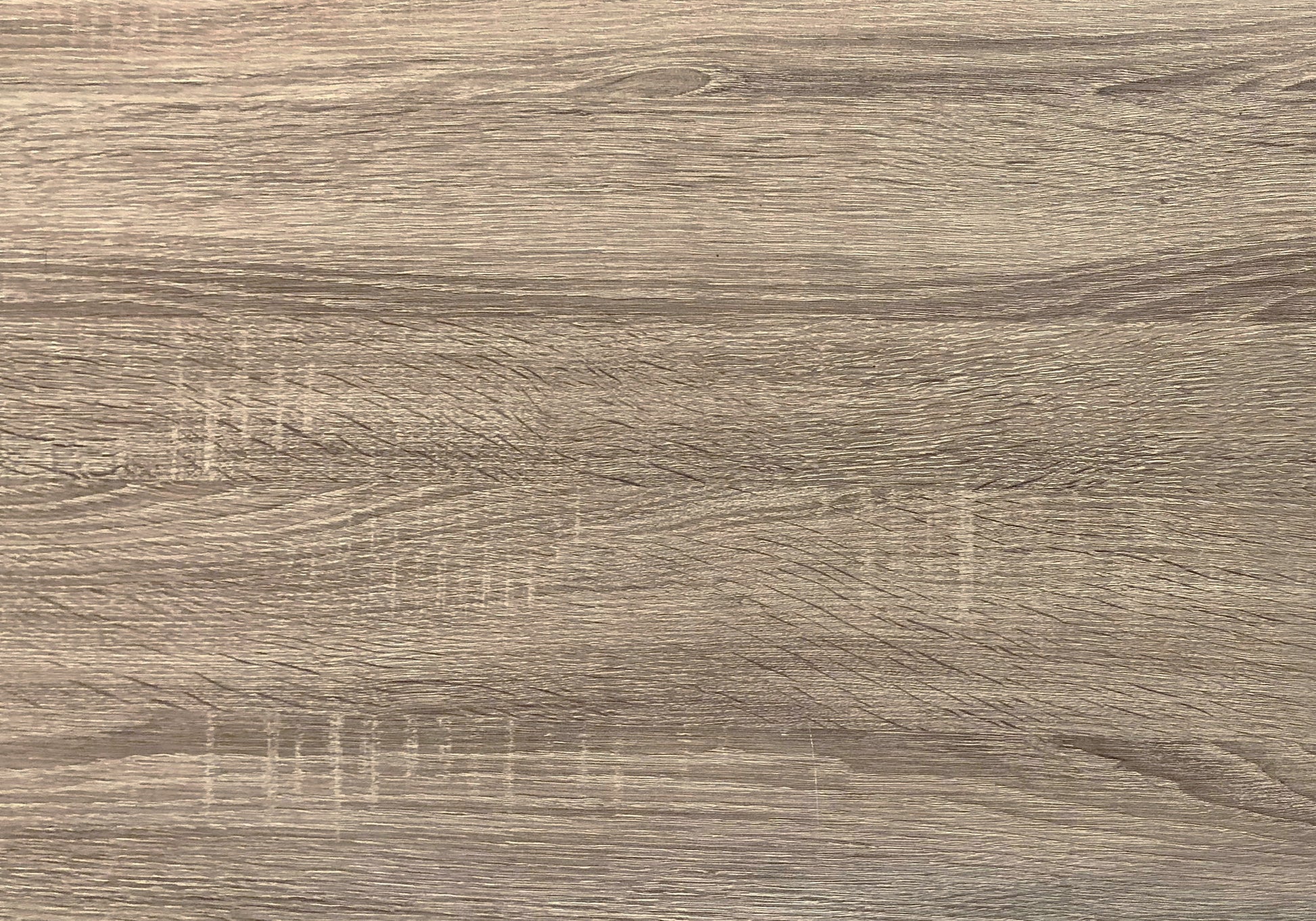 Closeup of a rustic wood grain texture in light brown ideal for furniture