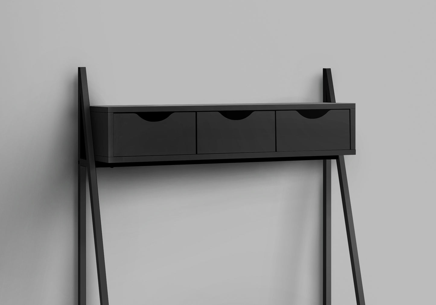 Black metal ladder desk with three drawers for a minimalist home office