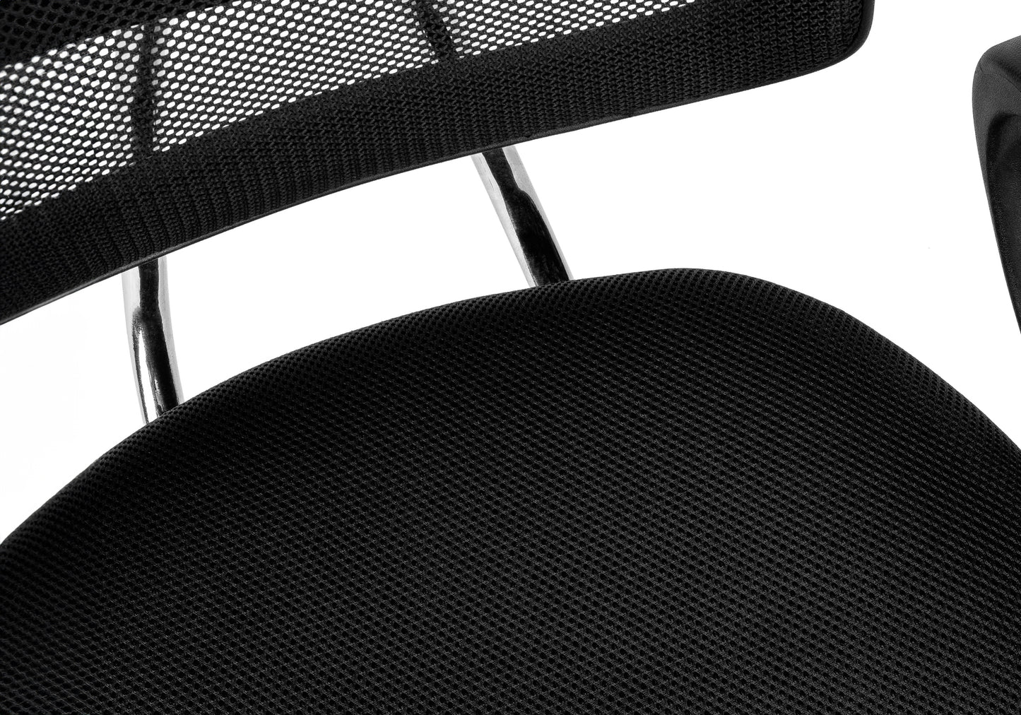 Closeup of black mesh office chair seat fabric with visible weave pattern