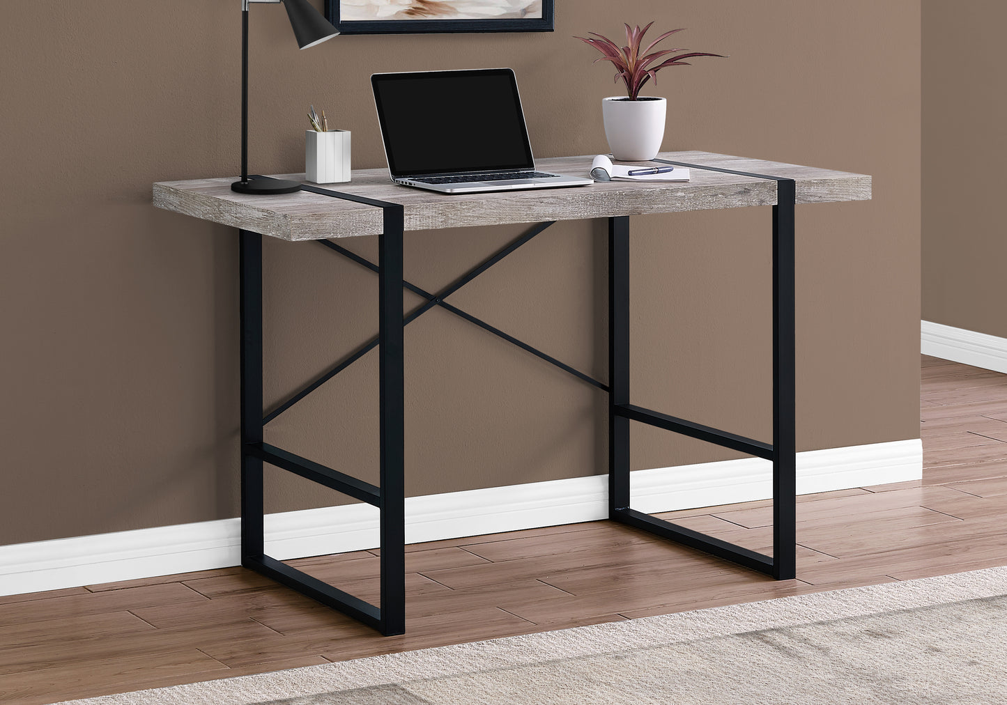 Rustic grey wood desk with black metal frame perfect for home office setup