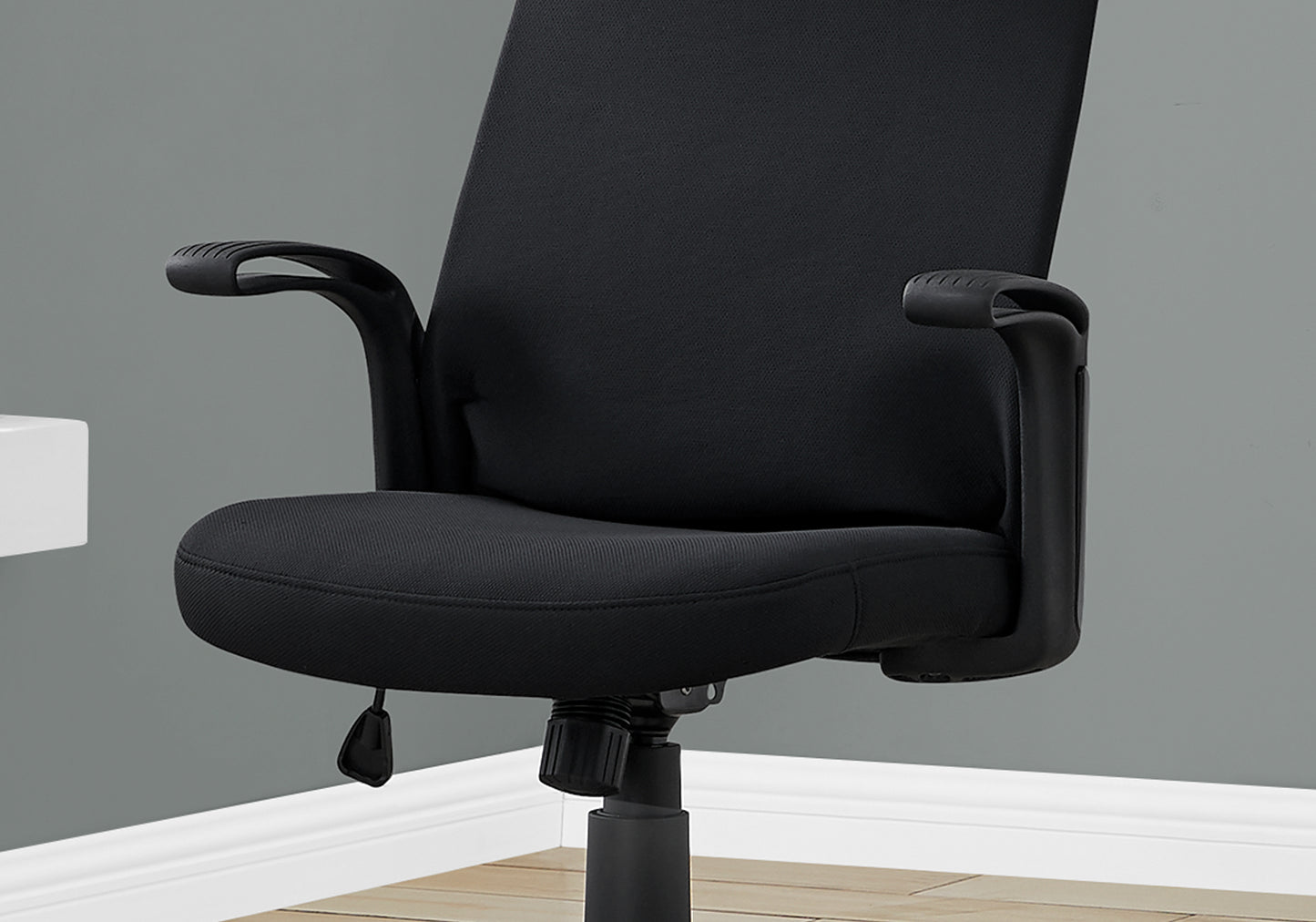 Black fabric office chair with adjustable armrests ideal for ergonomic seating
