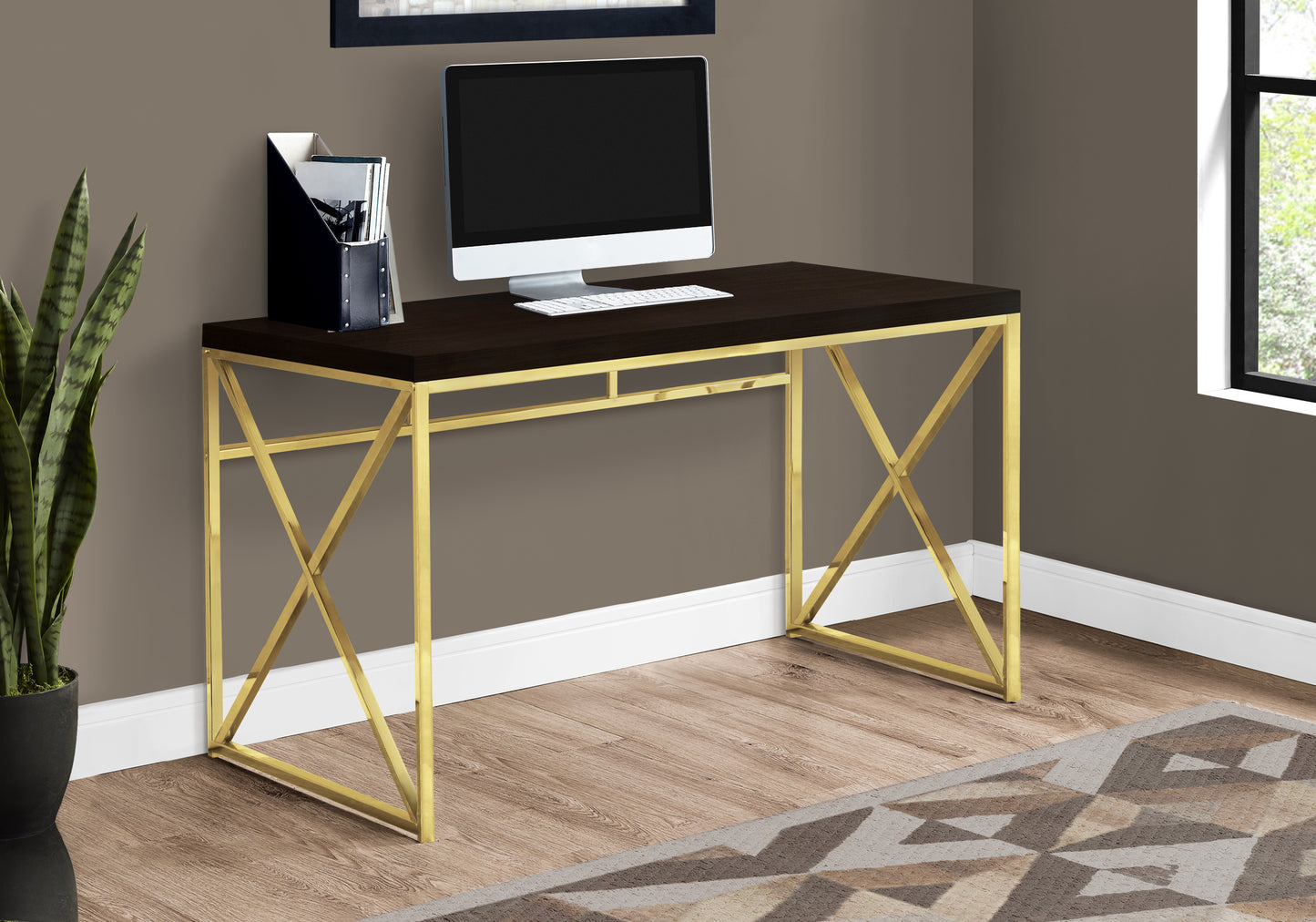 Dark wood desk with gold metal Xframe legs perfect for a modern home office