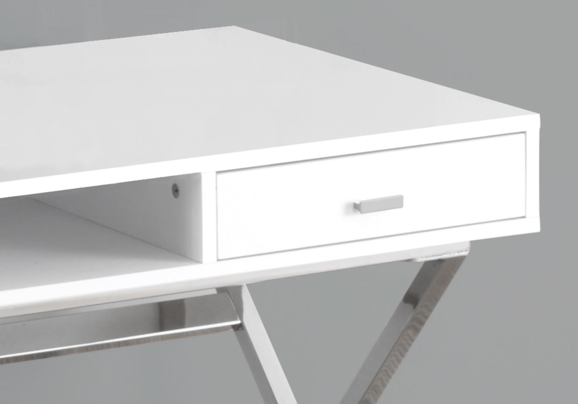Sleek white modern desk with silver drawer pull and open shelf space