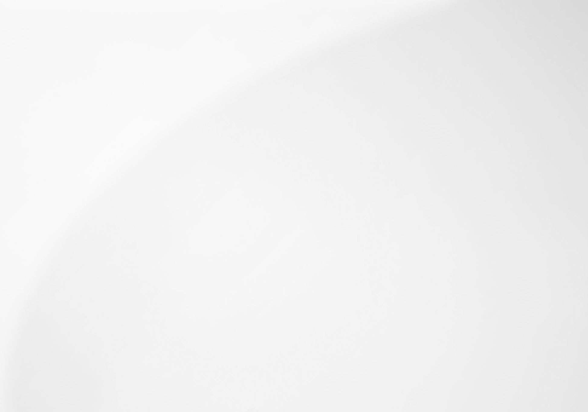 Soft white linen fabric with subtle texture ideal for minimalist bedding