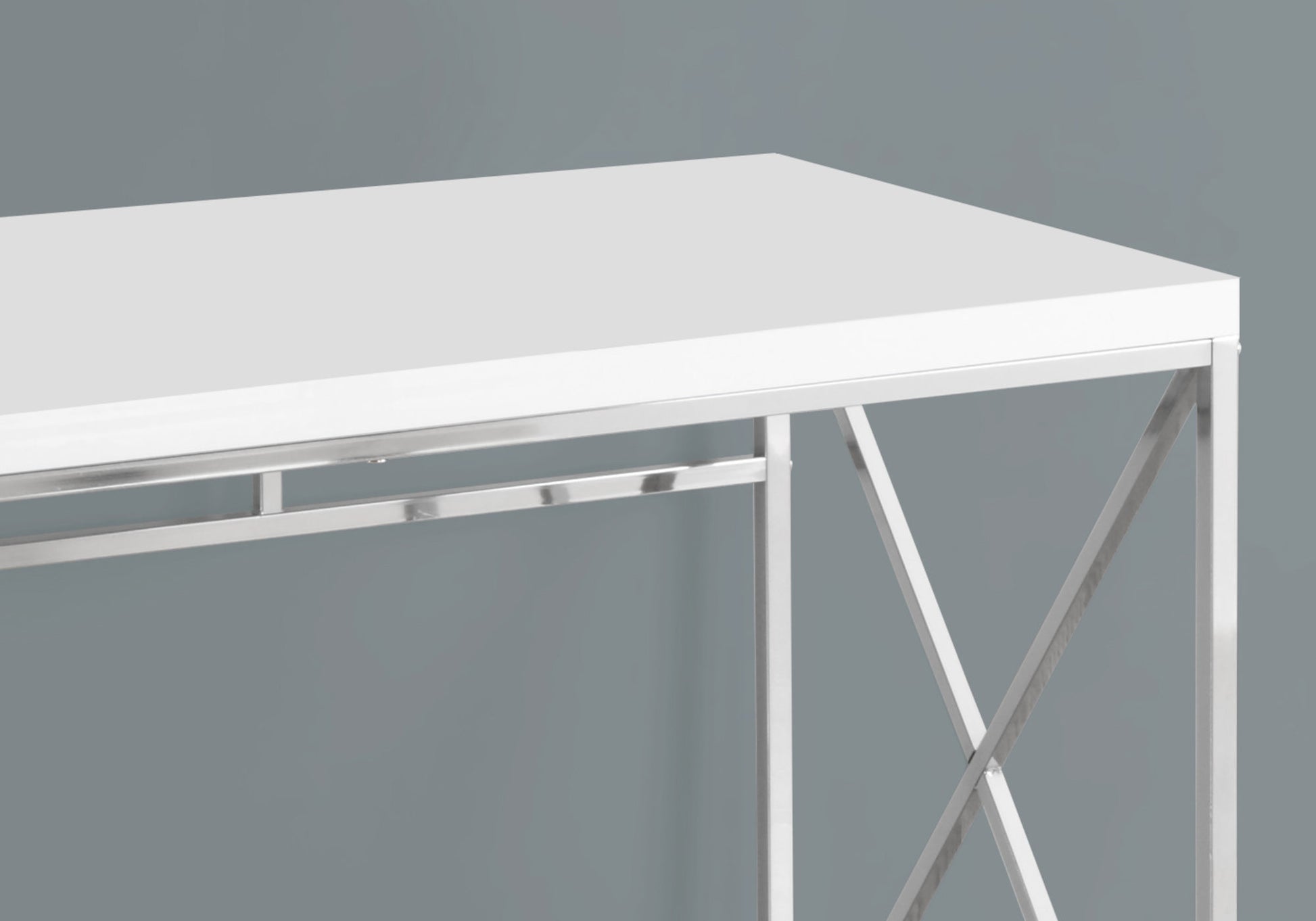White modern console table with sleek chrome legs and xdesign