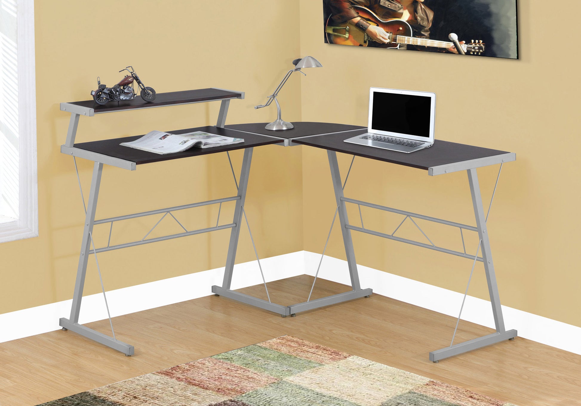 Dark brown corner computer desk with silver metal frame and two shelves