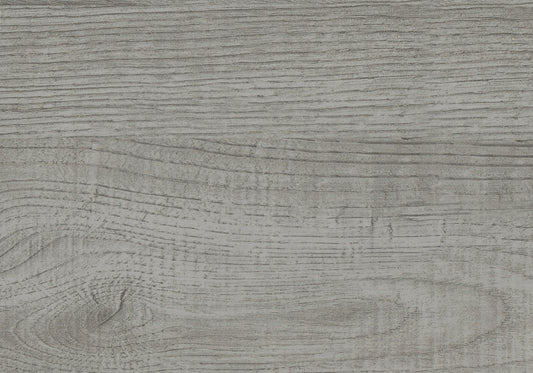 Closeup of distressed grey wood grain texture perfect for furniture