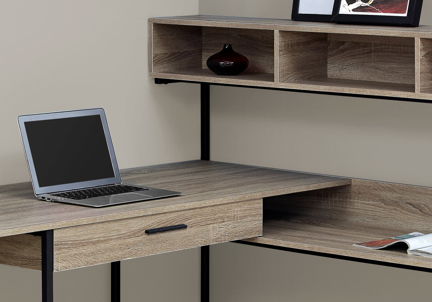 Modern oak laminate corner desk with black metal frame and laptop