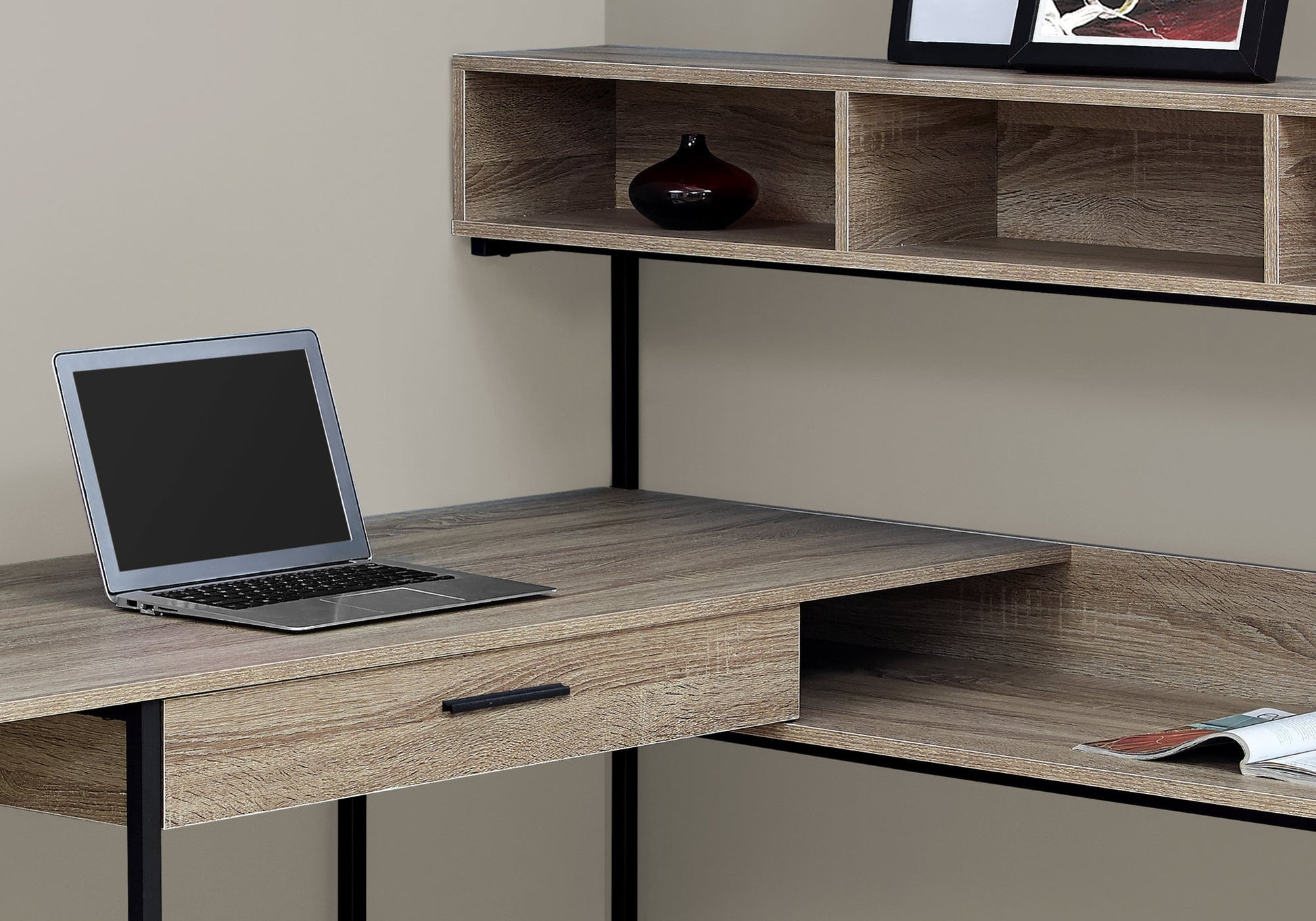Modern oak laminate corner desk with black metal frame and laptop