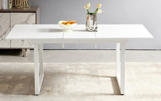 Modern white extendable dining table with sleek metal legs for contemporary kitchens