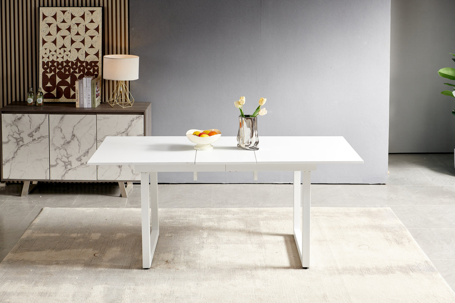 White modern dining table with extendable leaf and matte metal legs