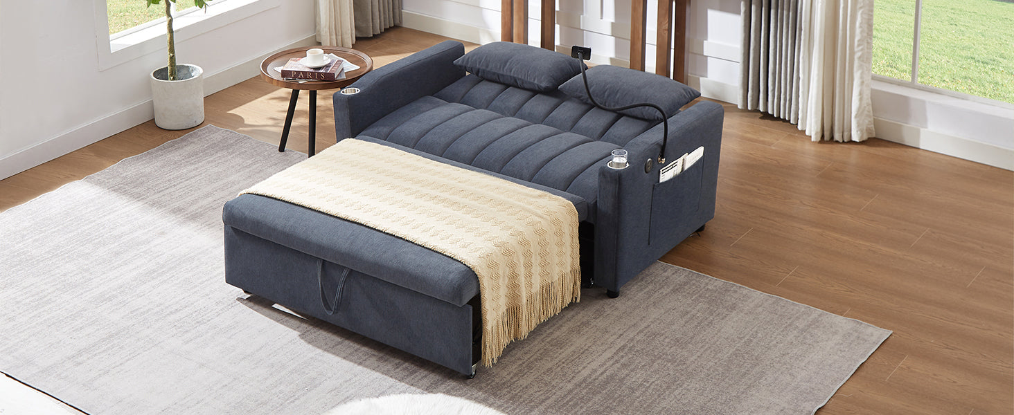 Navy blue convertible sofa bed with pullout ottoman and cup holders