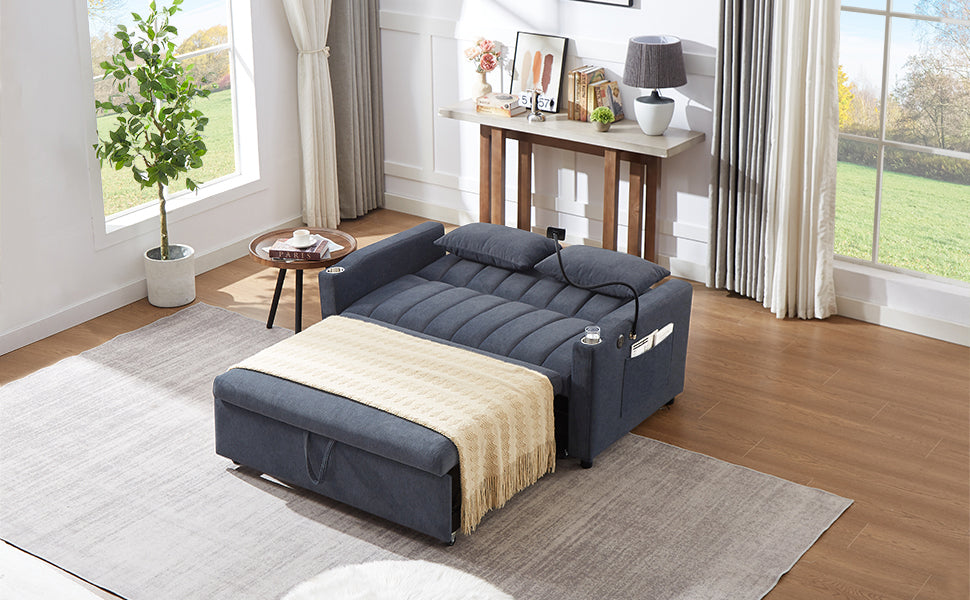 Dark blue upholstered sofa bed with pullout ottoman and builtin storage ideal for small living spaces