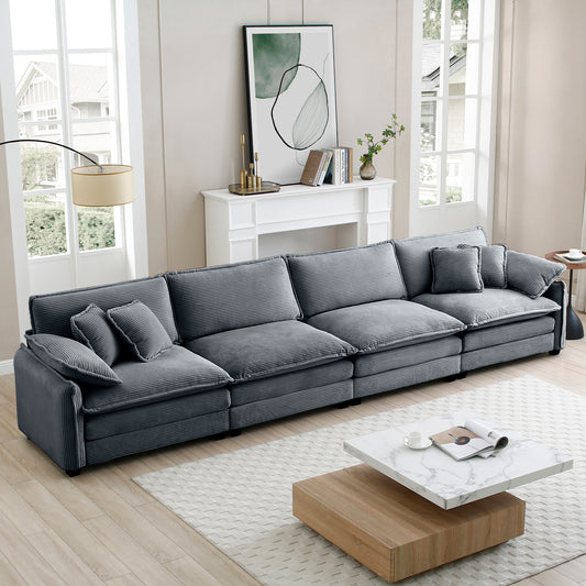 Deep grey corduroy sectional sofa with plush throw pillows perfect for modern living rooms