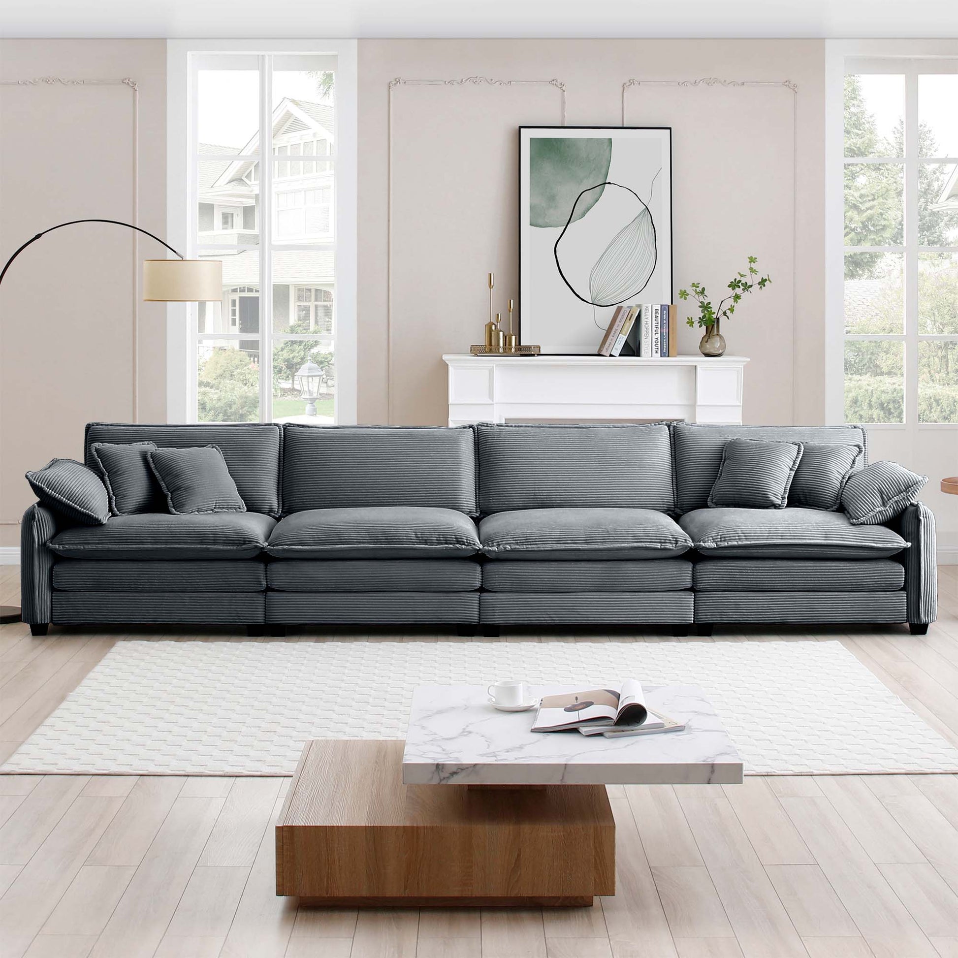 Spacious modular sectional sofa in dark grey corduroy fabric with plush cushions perfect for modern living rooms