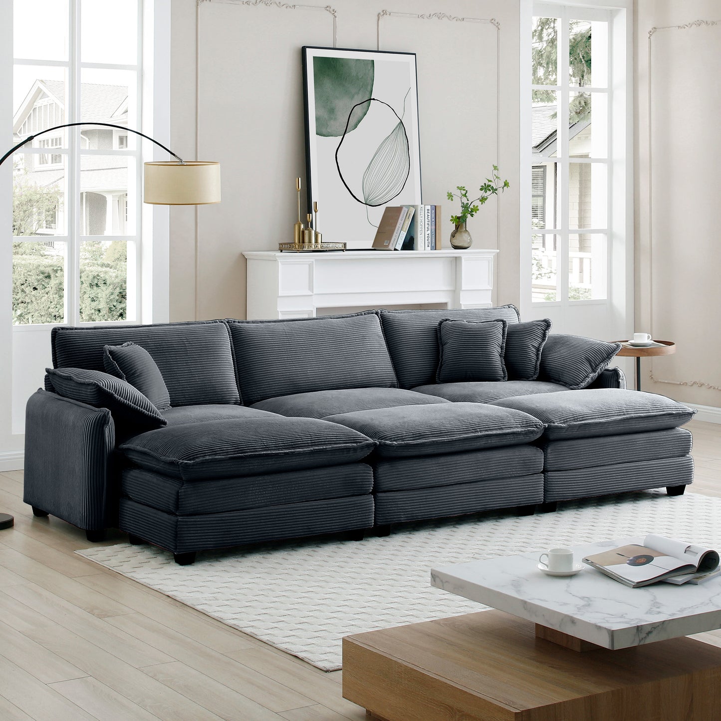 Plush charcoal corduroy sectional sofa with deep seats and plush throw pillows