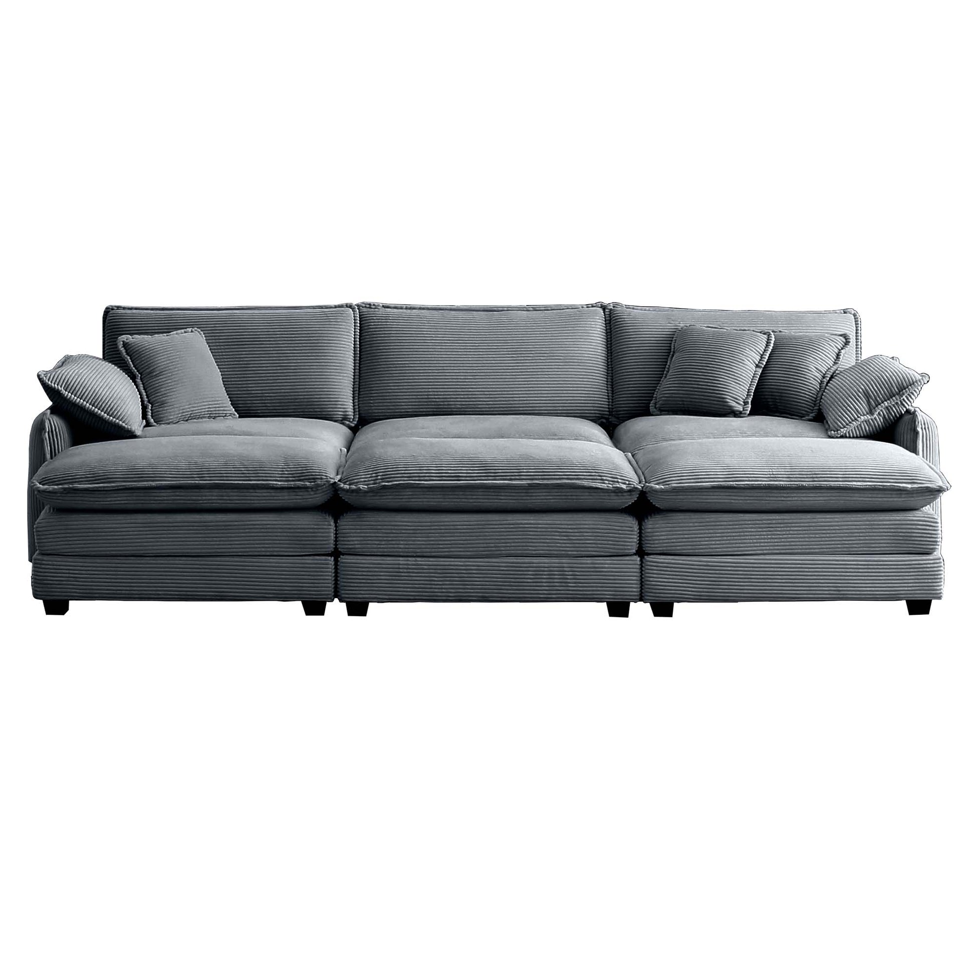 Plush grey corduroy sectional sofa with multiple seating areas and matching throw pillows
