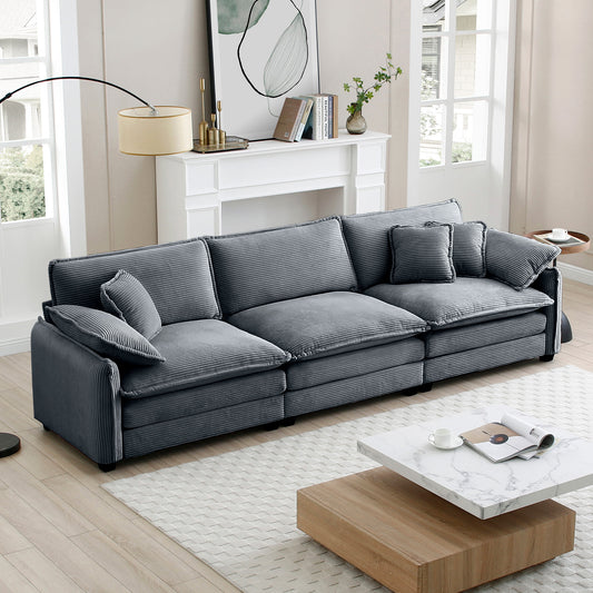 Gray corduroy sectional sofa with plush cushions and matching throw pillows