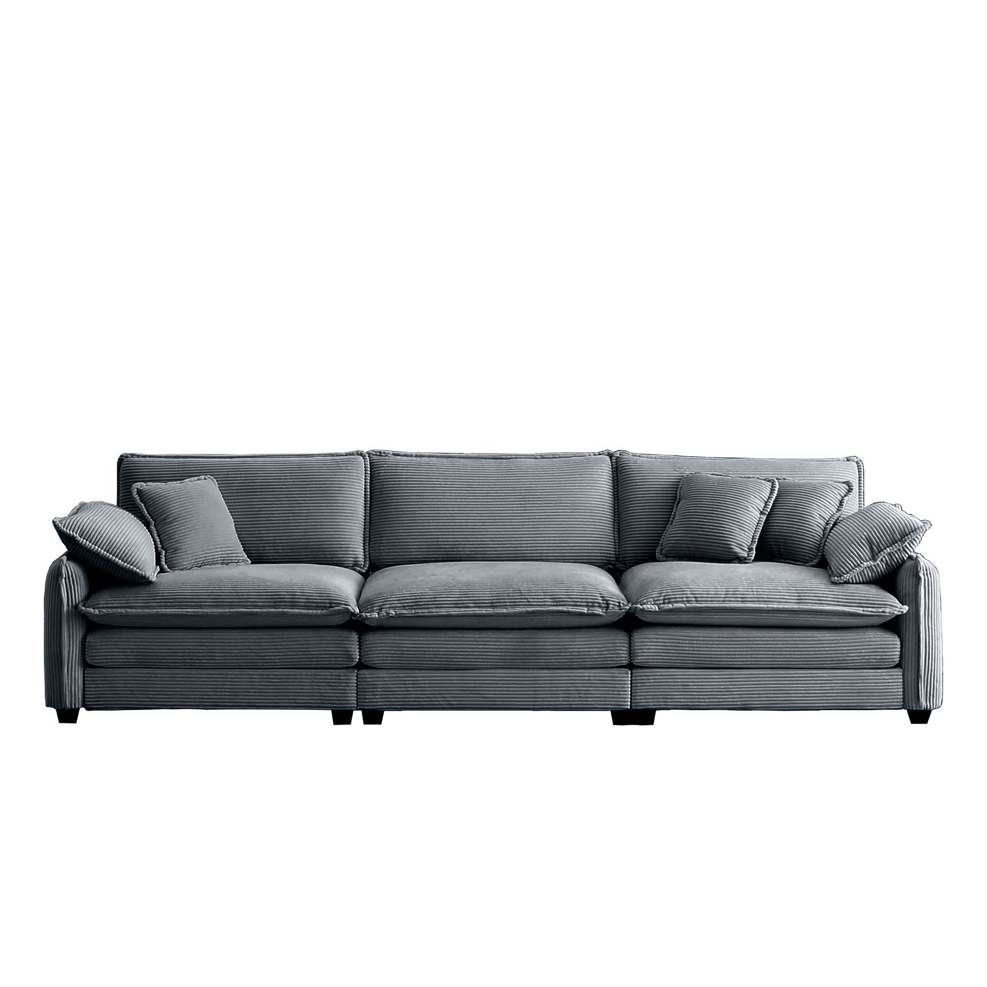 Plush grey corduroy sofa with three deep seats and matching throw pillows perfect for modern living rooms