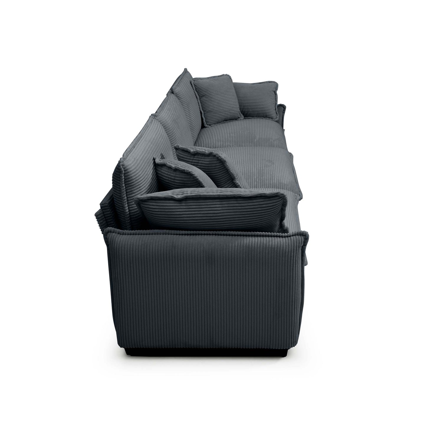 Dark gray corduroy sectional sofa with plush pillows perfect for a modern living room