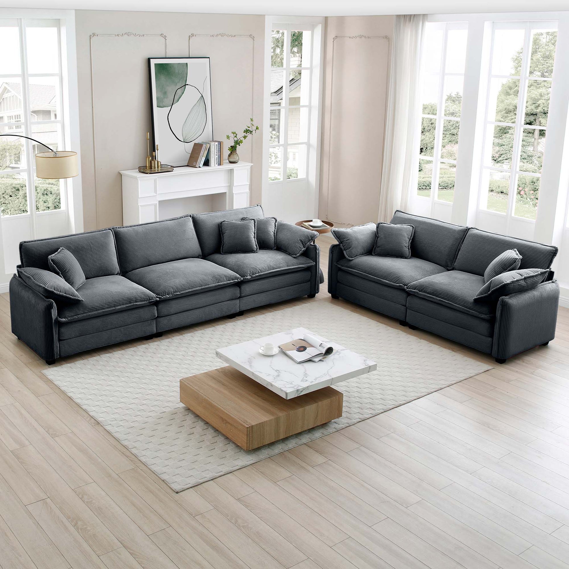 Dark gray corduroy sectional sofa with plush cushions and matching throw pillows