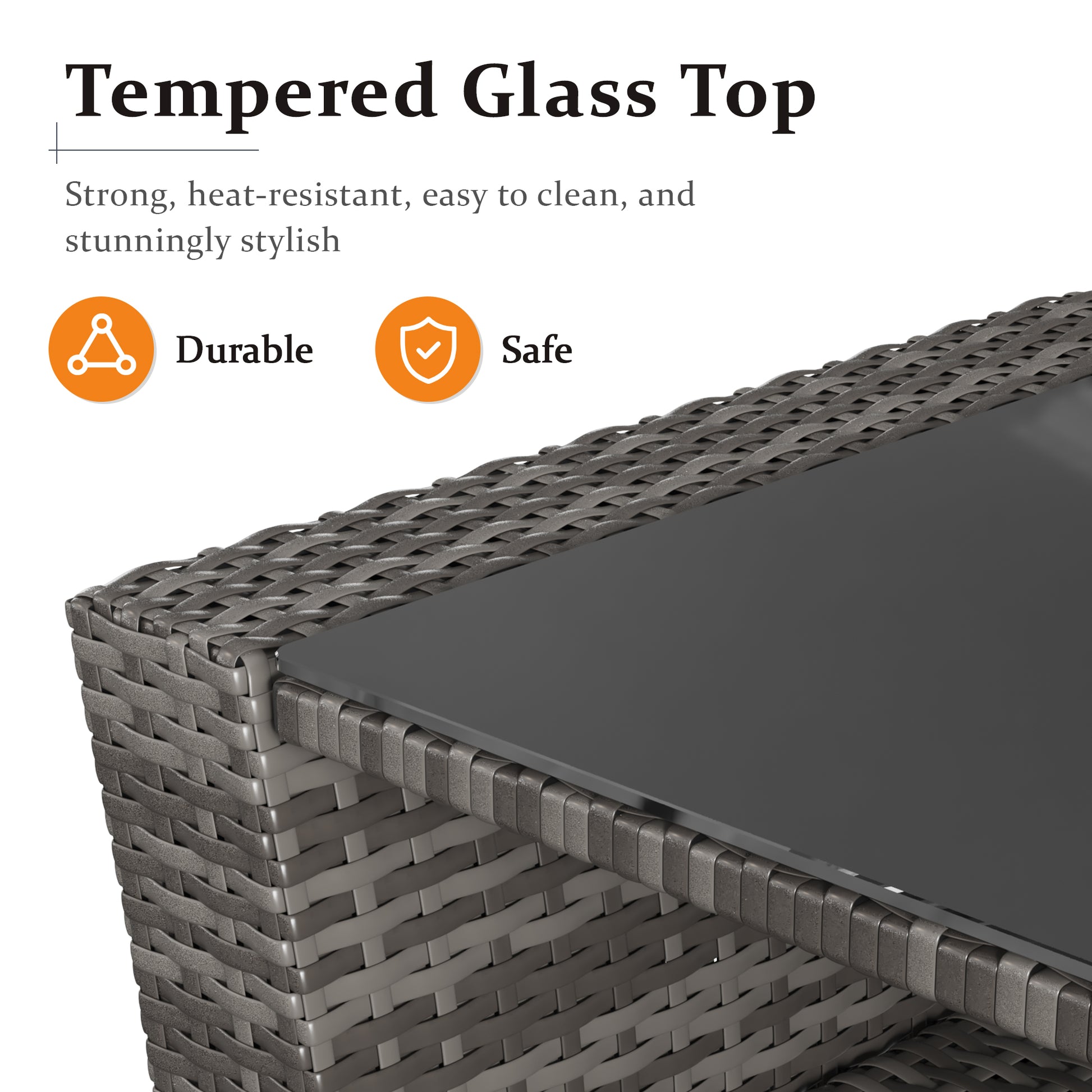 Dark gray wicker table with a sleek tempered glass top