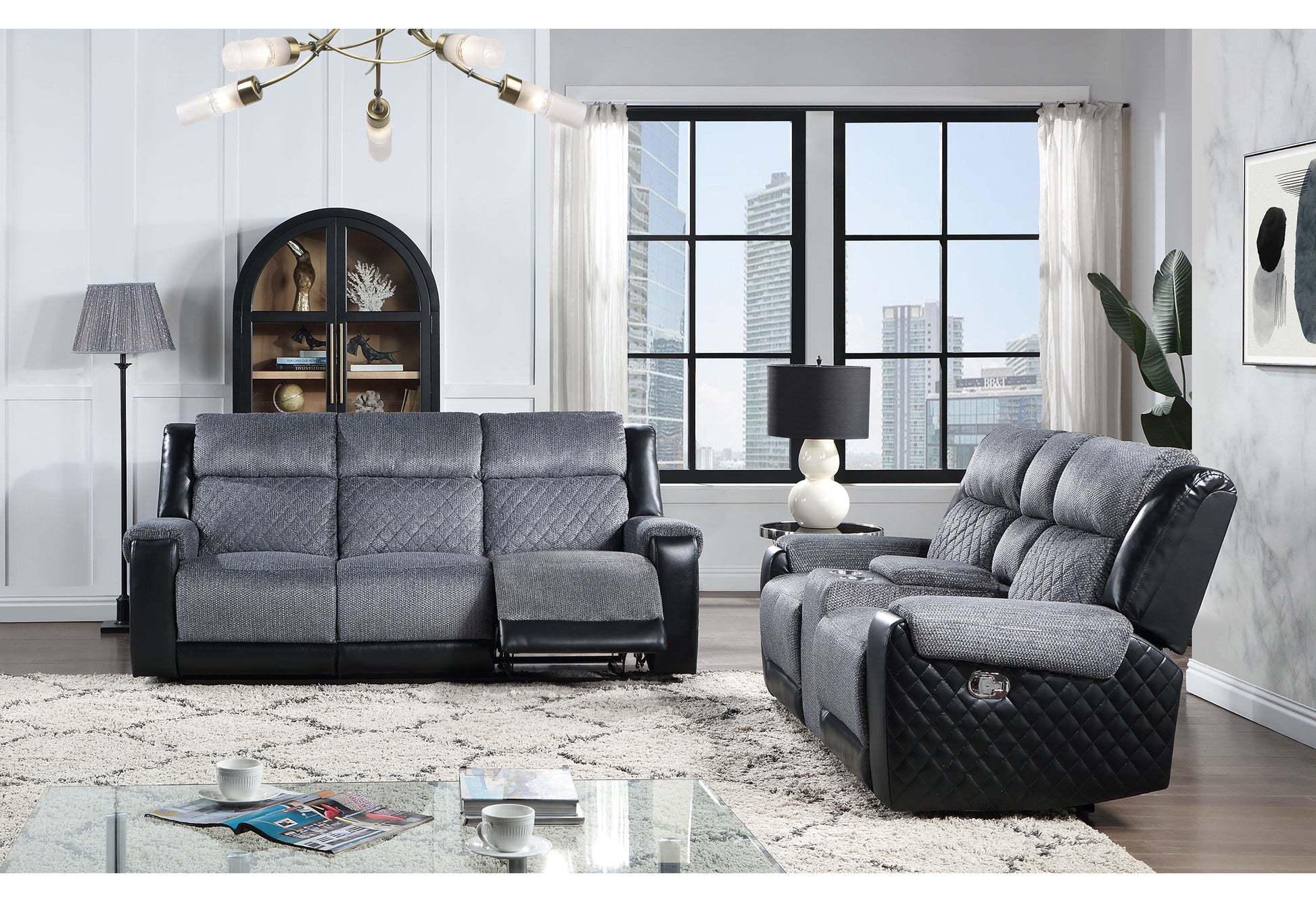 Gray upholstered recliner sofa with diamond stitching and black leather accents