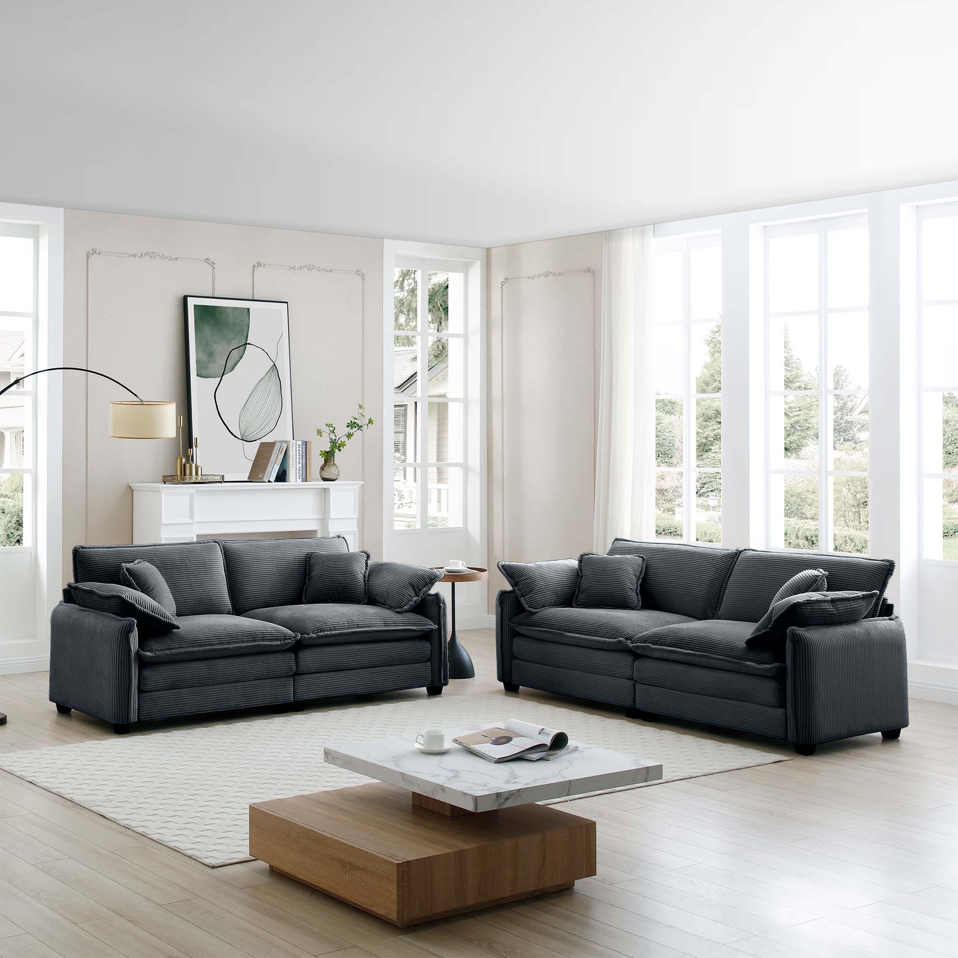 Dark grey corduroy sofa set with plush cushions and matching accent pillows