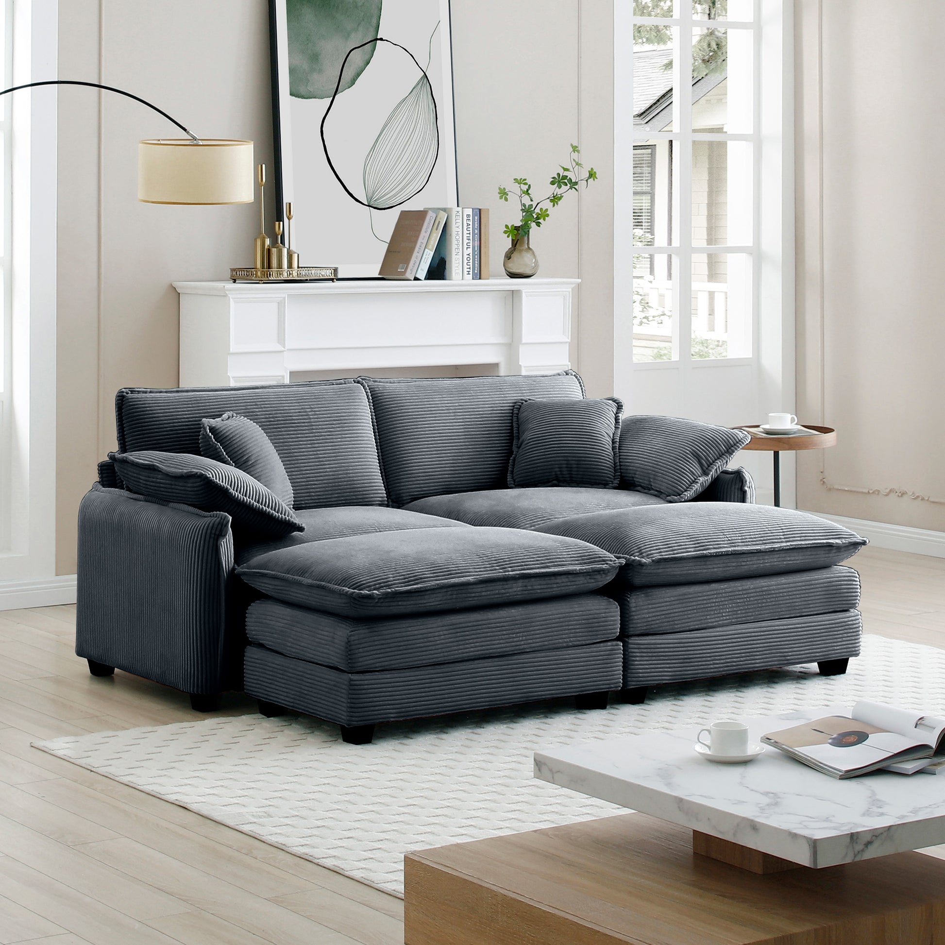 Plush charcoal grey corduroy sectional sofa with plush cushions and throw pillows