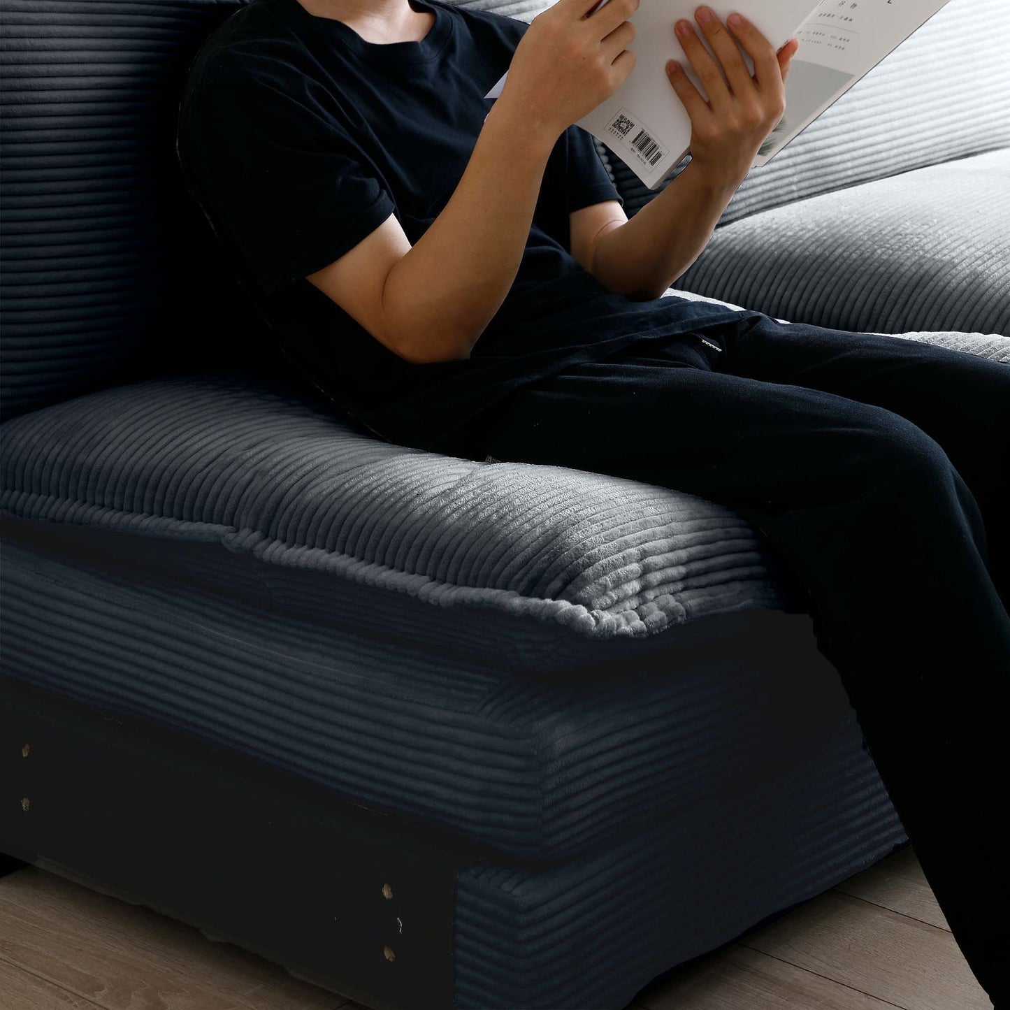 Dark grey corduroy sectional sofa with plush cushions perfect for relaxing